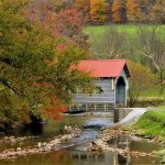 A covered bridge spanning a river