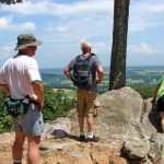 MCM members looking over a valley