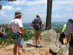 MCM members looking over a valley