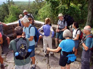 Members of MCM overlooking a valley